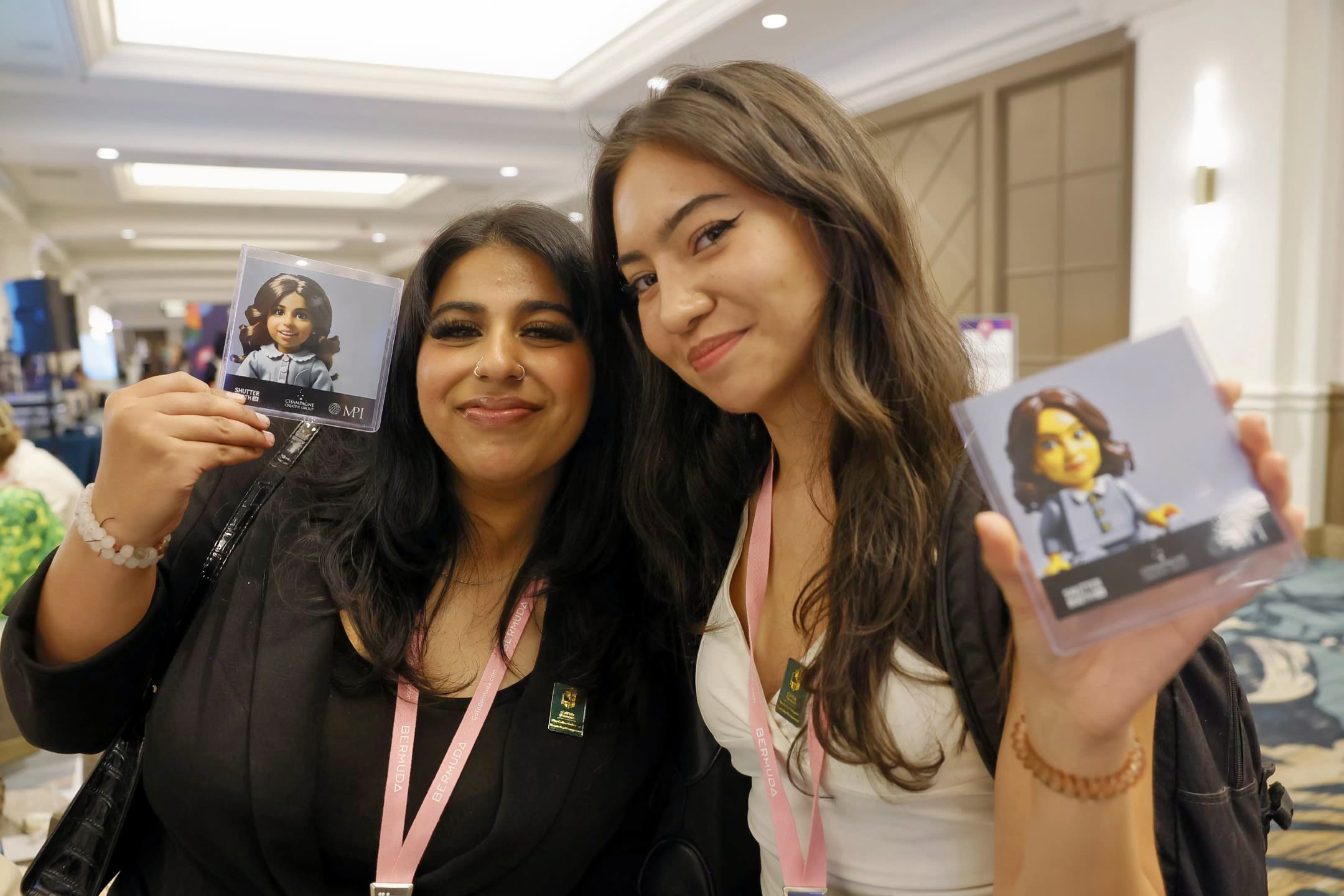 Two women smiling at camera