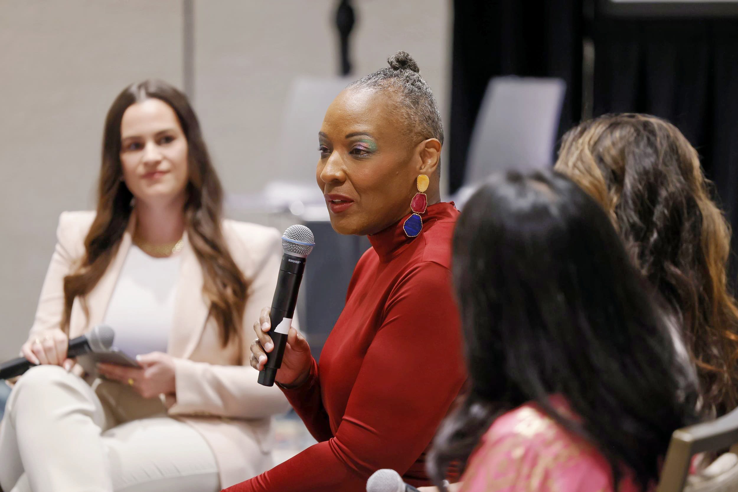 Woman talking into mic