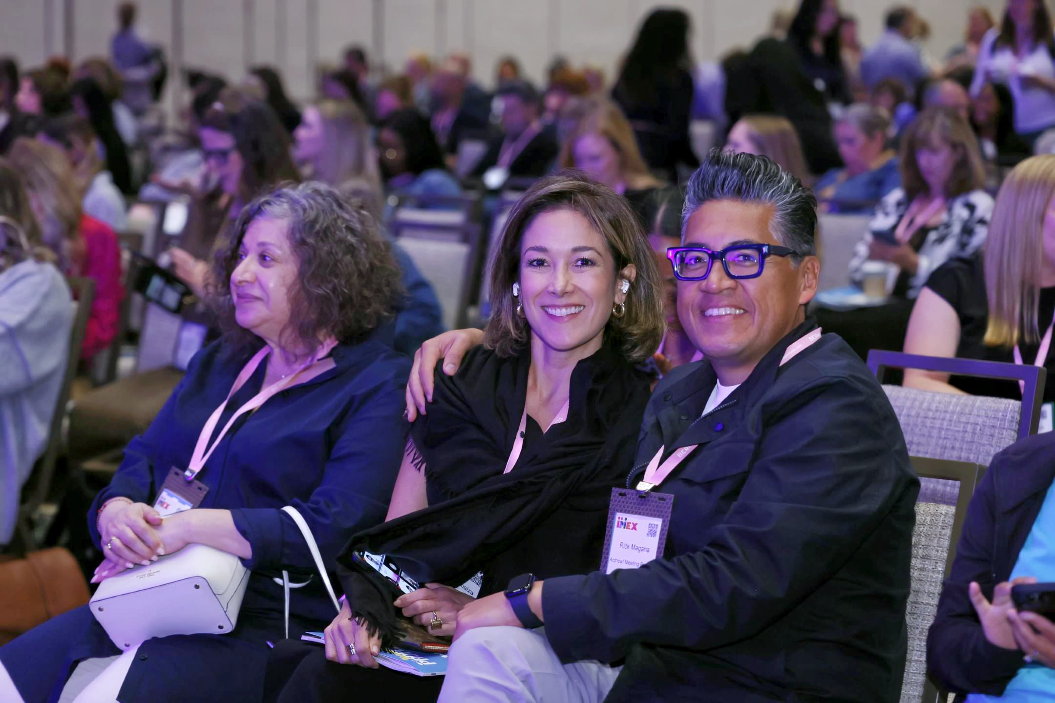 Two people smiling at camera
