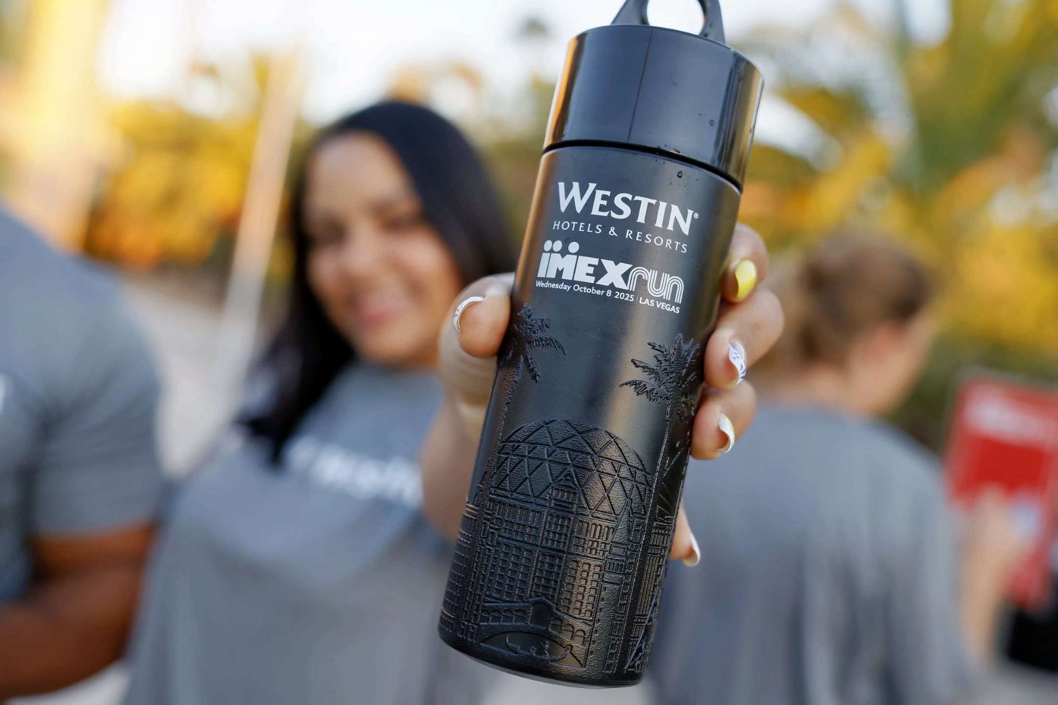 Woman holding waterbottle