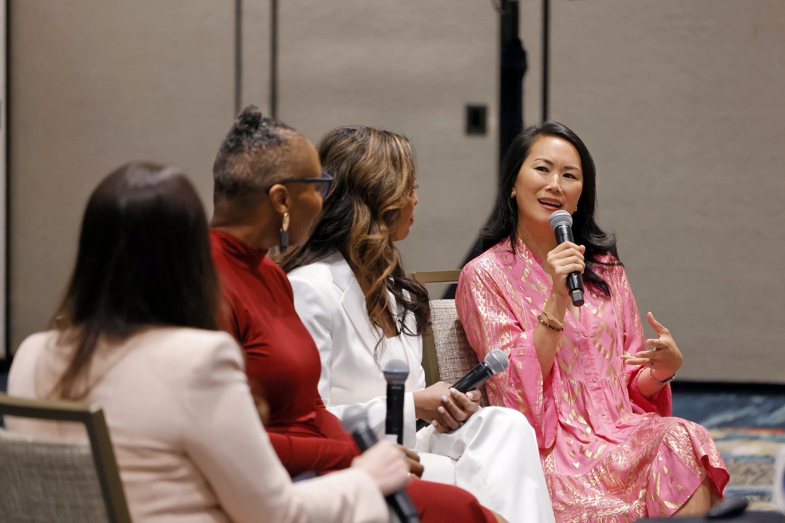 Woman talking into mic