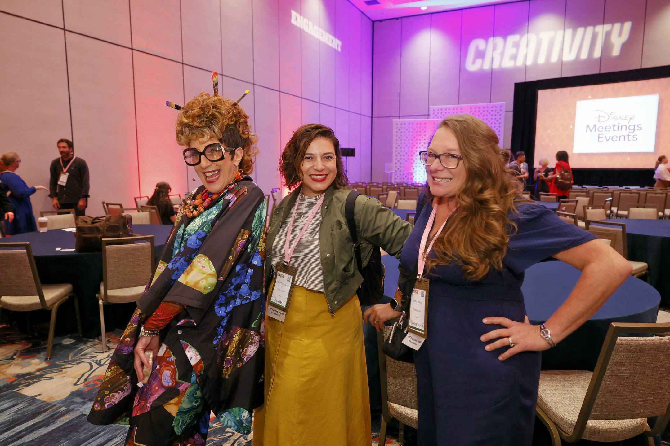 Three women smiling at camera
