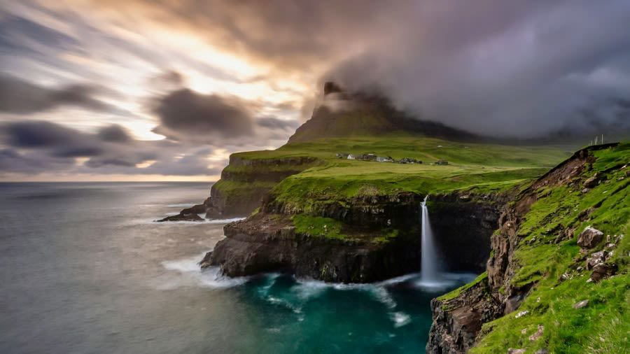 Cliffs and waterfall into sea
